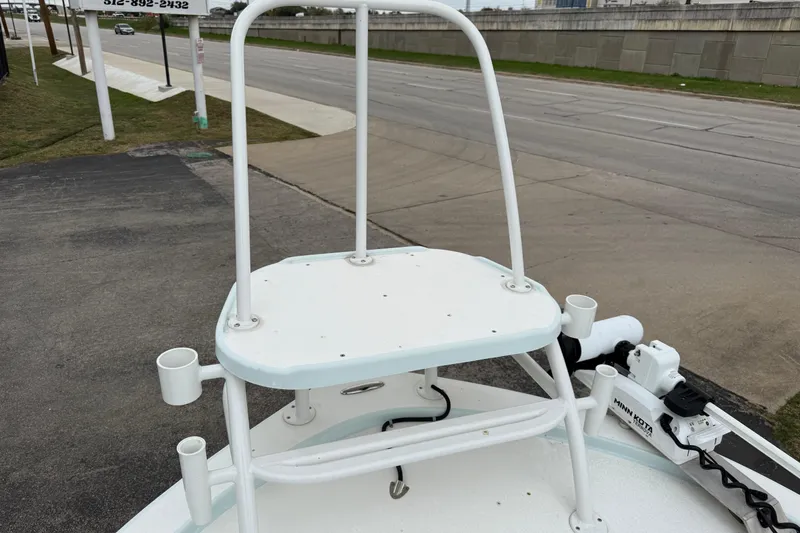 Slide: The Image of 2023 Shallow Sport 25 X3 boat with elevated platform and rod holders. - 50