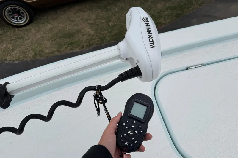Slide: The Image of Remote control for Minn Kota motor on 2023 Shallow Sport 25 X3 boat. - 53