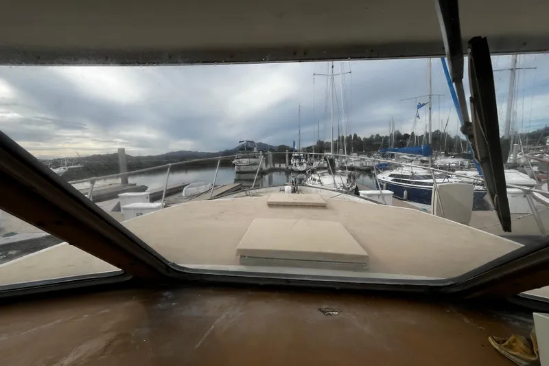 Slide: The Image of 1974 Tollycraft 37 Convertible boat view from cabin, docked at marina. - 30
