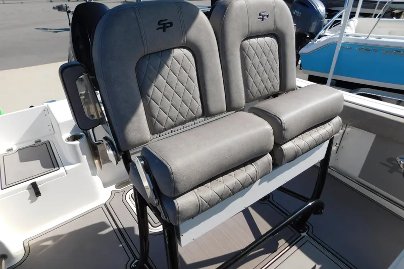 Slide: The Image of 2021 Sea Pro 219 Center Console boat seats with quilted design and armrests. - 15