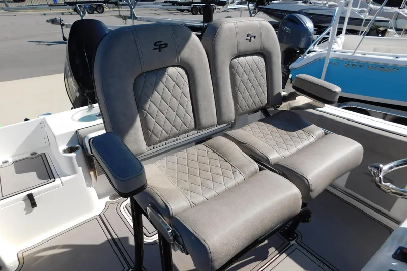 Slide: The Image of 2021 Sea Pro 219 Center Console boat seats with quilted design and armrests. - 16