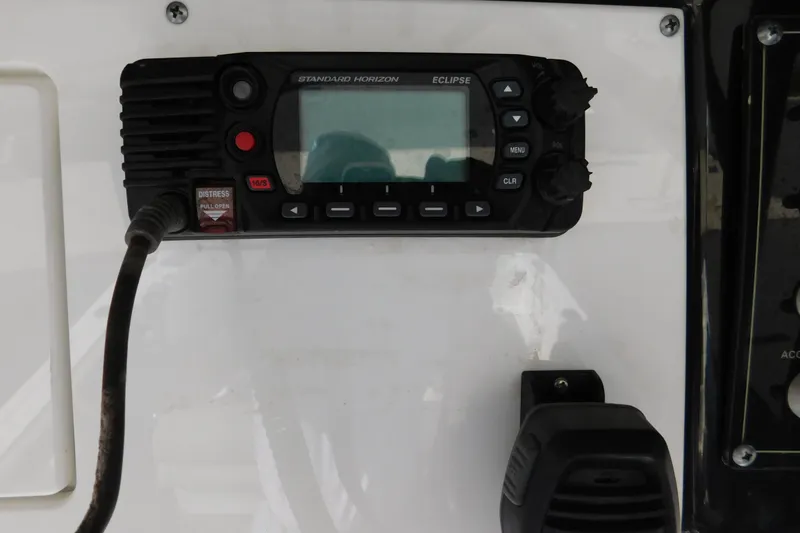 Slide: The Image of VHF radio on 2021 Sea Pro 219 Center Console boat dashboard. - 22