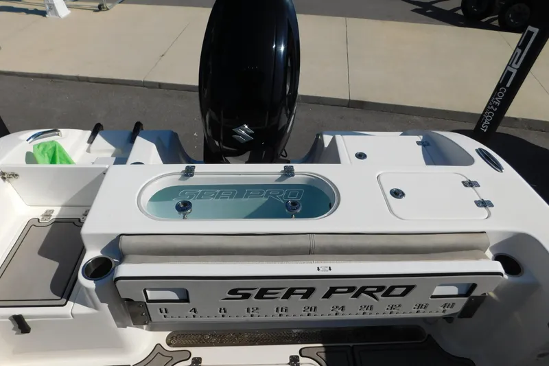 Slide: The Image of 2021 Sea Pro 219 Center Console boat with Suzuki engine and fishing features. - 25