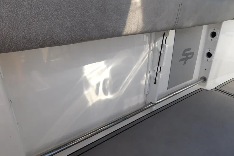 Slide: The Image of 2021 Sea Pro 219 Center Console interior detail with logo and seating. - 32