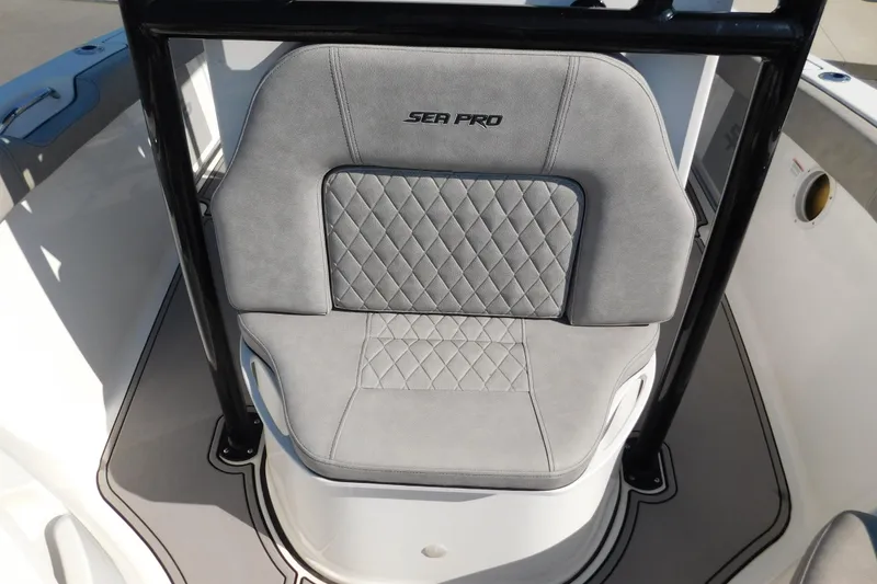 Slide: The Image of 2021 Sea Pro 219 Center Console boat seat with diamond-stitched gray upholstery. - 39