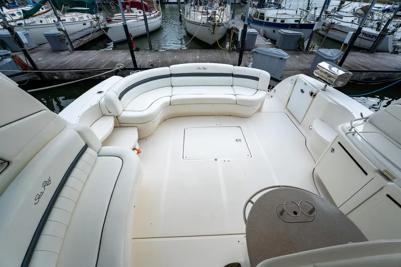 Slide: The Image of Luxurious seating on 2005 Sea Ray 500 Sundancer yacht at marina. - 10