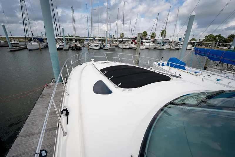 Slide: The Image of 2005 Sea Ray 500 Sundancer yacht docked at marina, view from bow. - 22