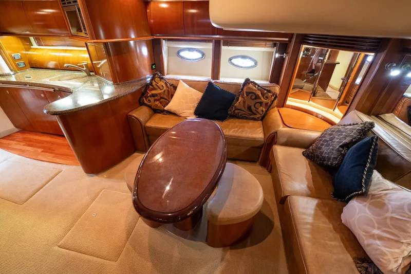 Slide: The Image of Luxurious interior of 2005 Sea Ray 500 Sundancer yacht with elegant seating and modern amenities. - 25