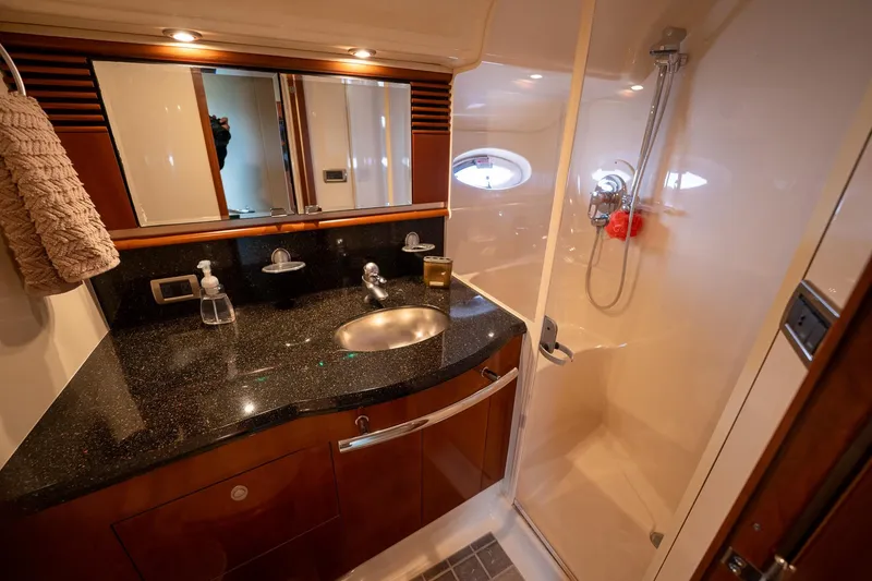 Slide: The Image of Luxurious bathroom in 2005 Sea Ray 500 Sundancer yacht with modern fixtures and elegant design. - 41