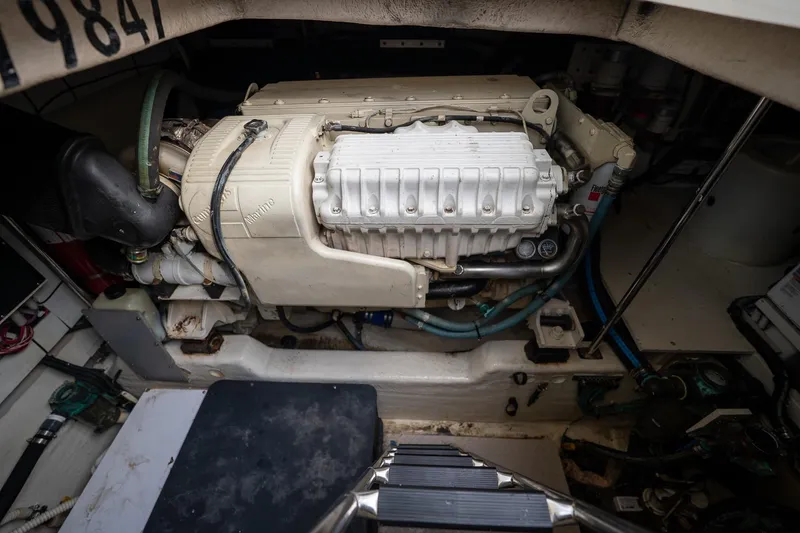 Slide: The Image of Engine room of 2005 Sea Ray 500 Sundancer with Onan marine generator. - 47