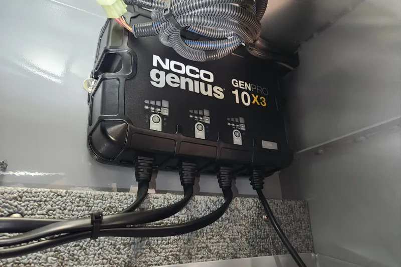 Slide: The Image of NOCO Genius GENPRO 10X3 charger in 2024 Hewescraft 180 Sportsman boat. - 12