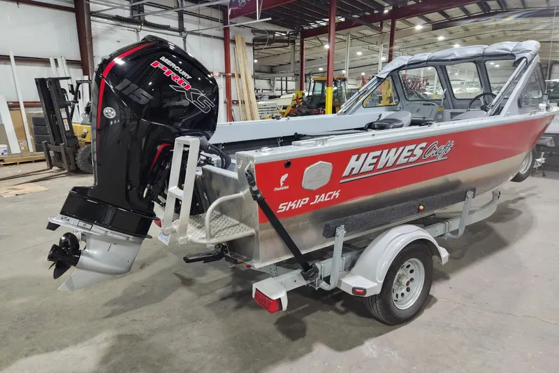 Slide: The Image of 2024 Hewescraft 180 Sportsman boat with Mercury 115 Pro XS engine in a warehouse. - 3