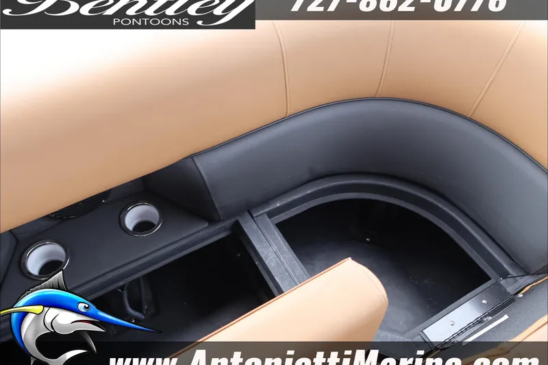 Slide: The Image of 2026 Bentley Pontoons Elite 223 Swingback interior seating with cup holders. - 16