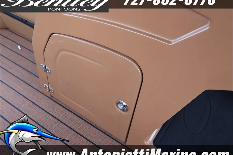 Slide: The Image of 2026 Bentley Pontoons Elite 223 Swingback Dual Capt, brown interior detail, marine flooring. - 25