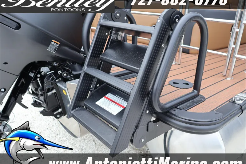 Slide: The Image of 2026 Bentley Pontoons Elite 223 Swingback Dual Capt, featuring a sturdy boarding ladder. - 7