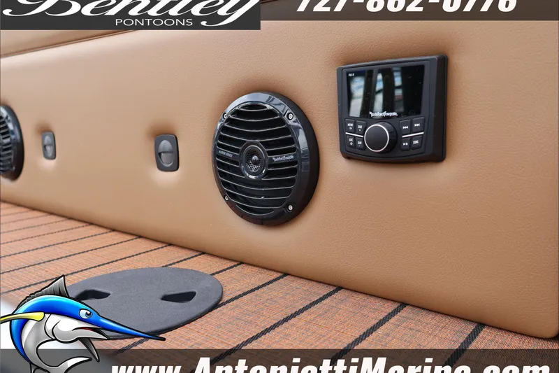 Slide: The Image of 2026 Bentley Pontoons Elite 223 interior with audio system and speaker detail. - 9