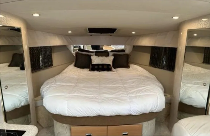 Slide: The Image of Luxurious cabin interior of a 2003 Formula 37 PC yacht with a cozy bed. - 17