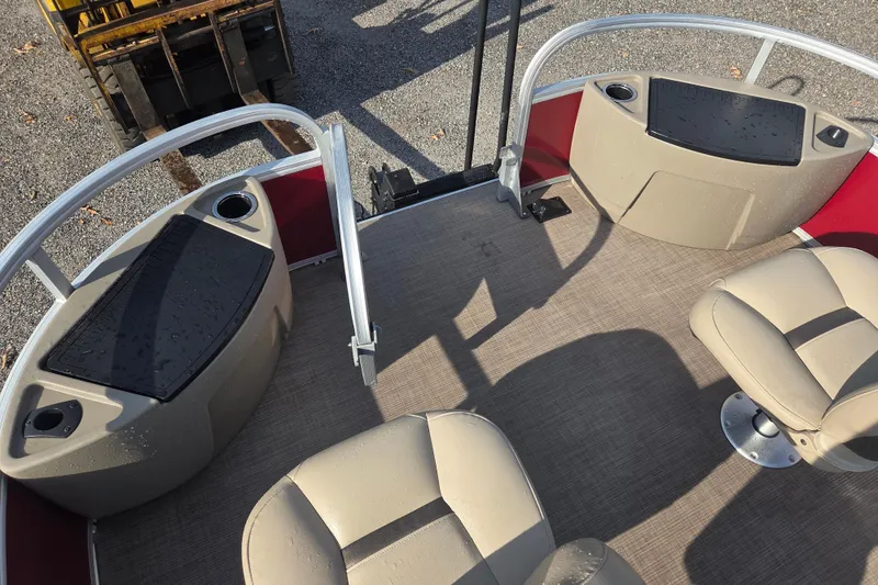 Slide: The Image of 2021 Sun Tracker Bass Buggy 18 DLX pontoon boat interior with seating and storage. - 6
