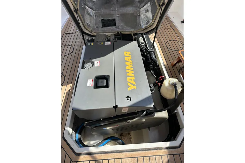 Slide: The Image of Engine compartment of a 2008 Wasque 26 boat featuring a Yanmar engine. - 44