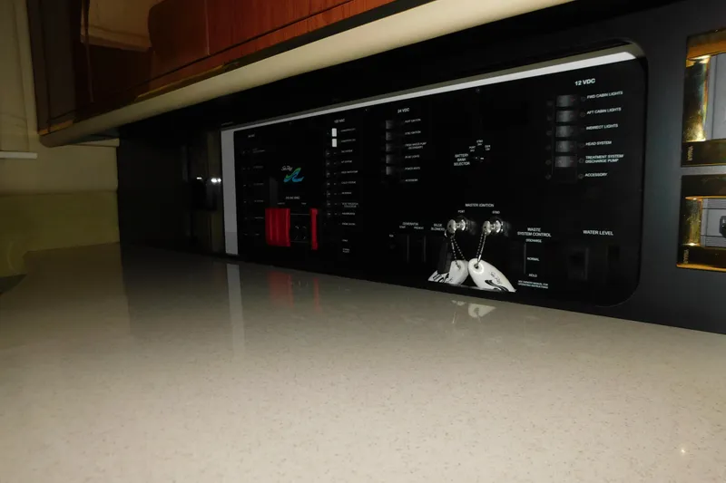 Slide: The Image of Control panel of a 1999 Sea Ray 500 Sundancer yacht interior. - 33