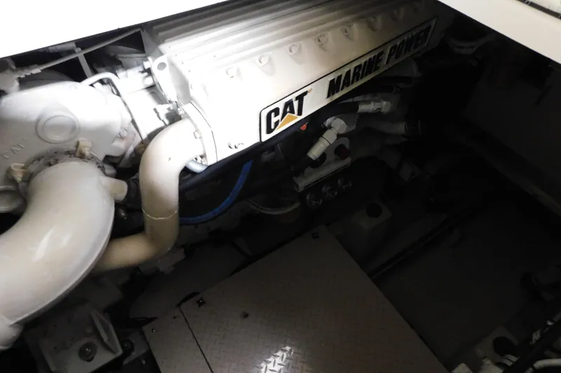 Slide: The Image of Engine compartment of 1999 Sea Ray 500 Sundancer with CAT Marine Power engine. - 40