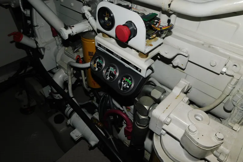 Slide: The Image of Engine compartment of a 1999 Sea Ray 500 Sundancer with gauges and wiring. - 41