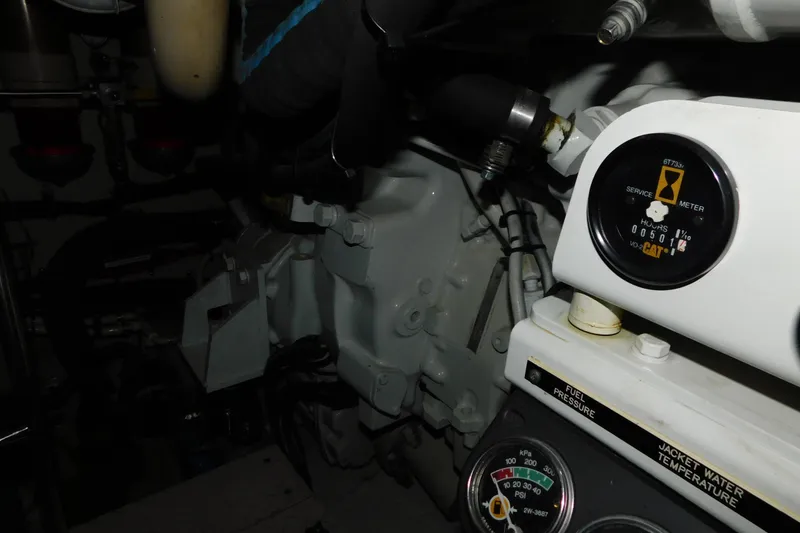 Slide: The Image of Engine room of 1999 Sea Ray 500 Sundancer with service meter and gauges. - 49