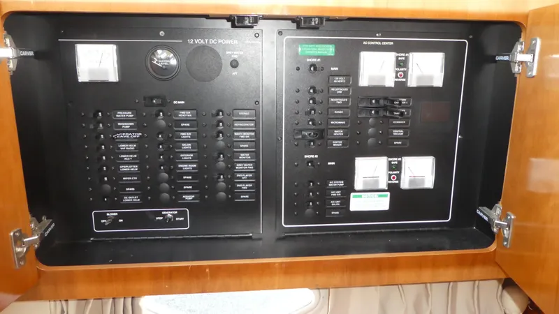Slide: The Image of Electrical control panel of 2005 Carver 38 Super Sport boat. - 13
