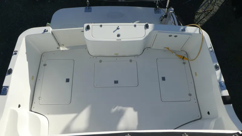 Slide: The Image of 2005 Carver 38 Super Sport boat deck, spacious and well-equipped for fishing or leisure. - 31