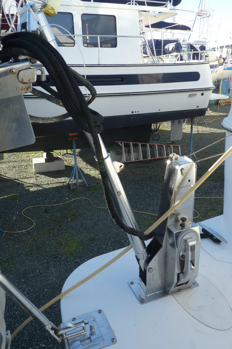 Slide: The Image of 2005 Carver 38 Super Sport boat detail with docked vessel in background. - 41