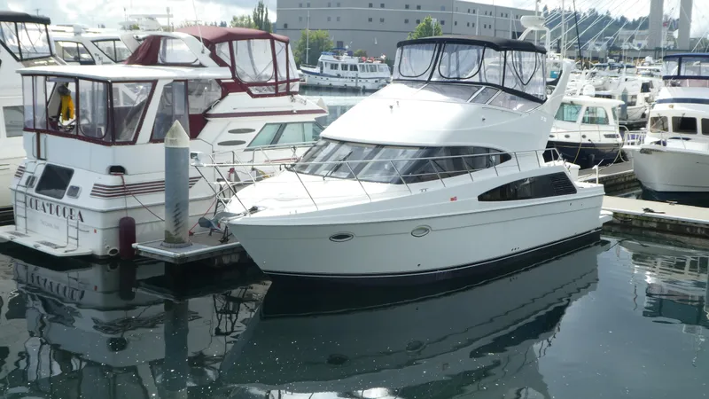 The Image of 2005 Carver 38 Super Sport yacht docked at marina. - 0