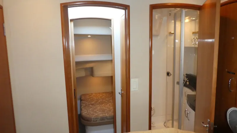 Slide: The Image of Interior of 2005 Carver 38 Super Sport yacht with bedroom and bathroom. - 18