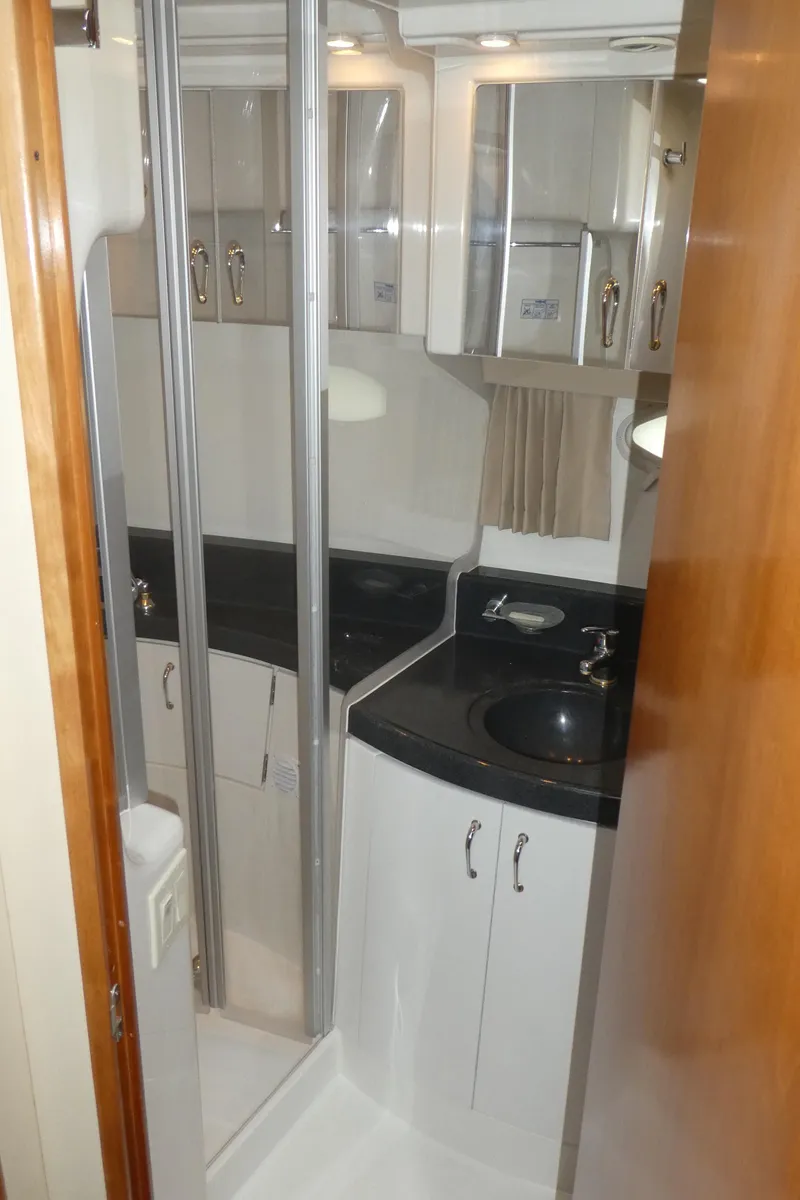 Slide: The Image of 2005 Carver 38 Super Sport yacht bathroom with sleek design and modern fixtures. - 20