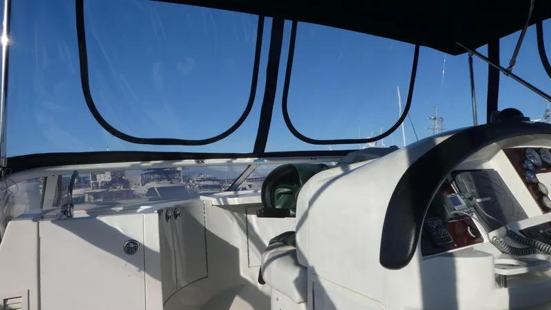 Slide: The Image of Interior view of 2005 Carver 38 Super Sport yacht cockpit. - 27