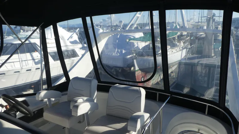 Slide: The Image of Interior view of 2005 Carver 38 Super Sport yacht at marina. - 30