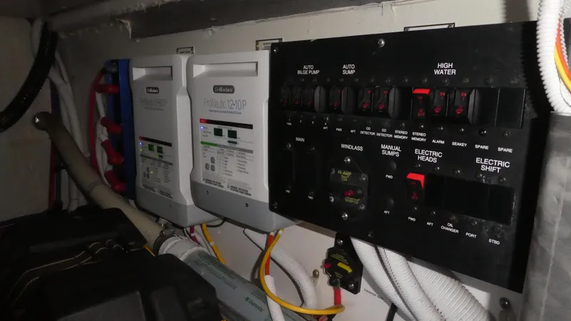 Slide: The Image of Electrical panel in 2005 Carver 38 Super Sport boat engine room. - 37