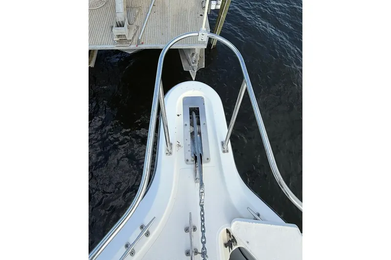 Slide: The Image of Bow view of 2003 Pursuit 3070 Offshore Center Console at dock. - 13