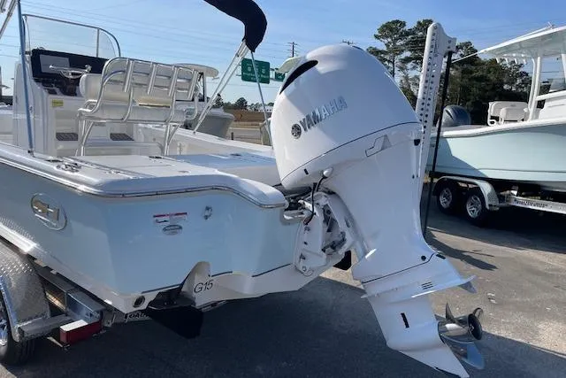 Slide: The Image of 2021 Sea Hunt BX 22 BR boat with Yamaha outboard motor on trailer. - 4