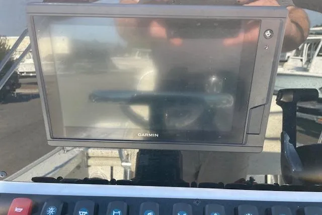 Slide: The Image of Garmin display on 2021 Sea Hunt BX 22 BR boat dashboard. - 6