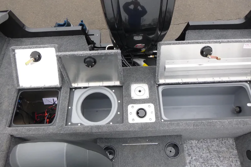 Slide: The Image of 2026 Tracker Pro Guide V-175 WT boat interior with storage compartments and seating. - 11