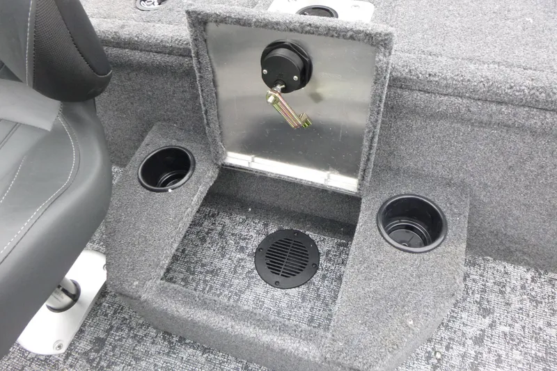 Slide: The Image of 2026 Tracker Pro Guide V-175 WT boat interior with cup holders and control panel. - 12