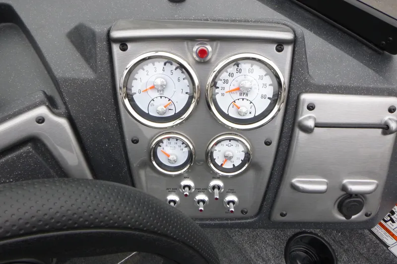 Slide: The Image of Dashboard of 2026 Tracker Pro Guide V-175 WT boat with gauges and controls. - 15