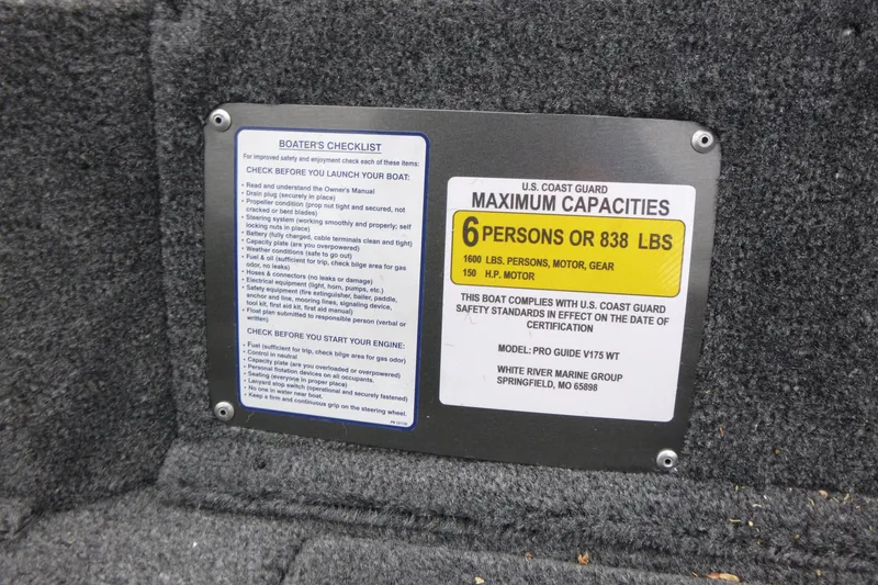 Slide: The Image of 2026 Tracker Pro Guide V-175 WT capacity plate, 6 persons or 838 lbs, safety checklist. - 16