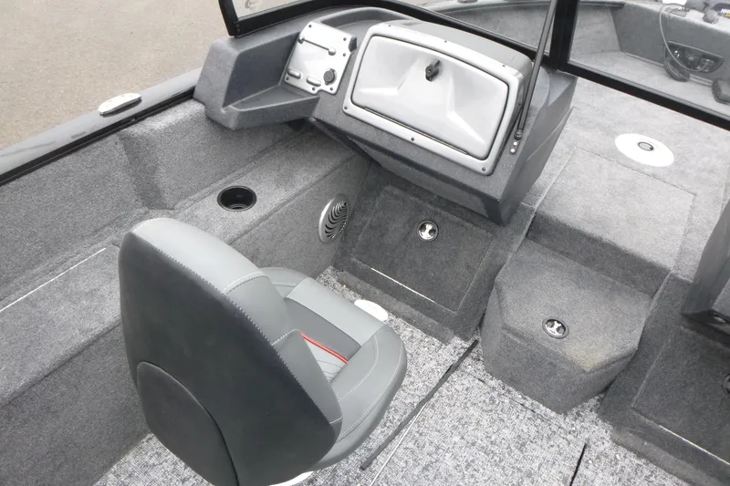 Slide: The Image of Interior of 2026 Tracker Pro Guide V-175 WT boat with gray seating and dashboard. - 17