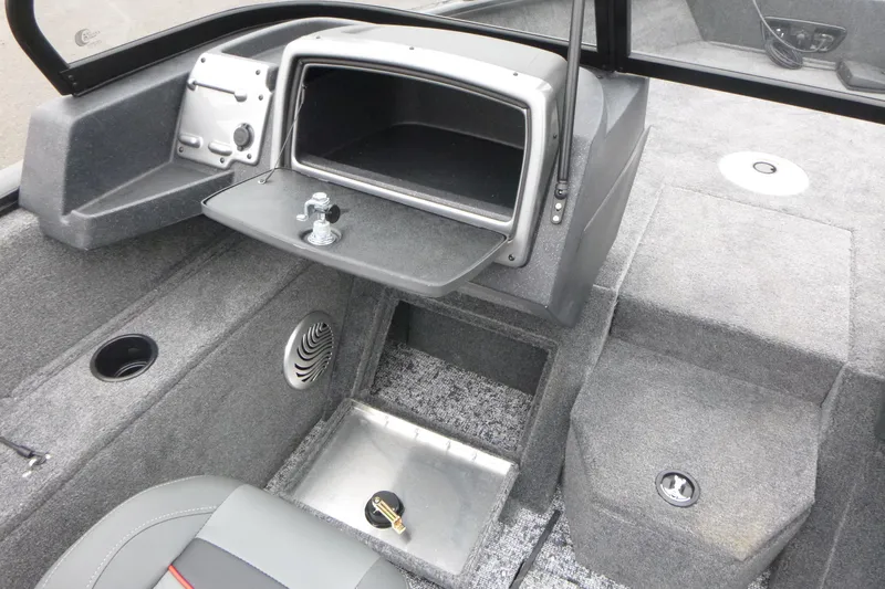 Slide: The Image of 2026 Tracker Pro Guide V-175 WT boat interior with storage compartment and speaker. - 18
