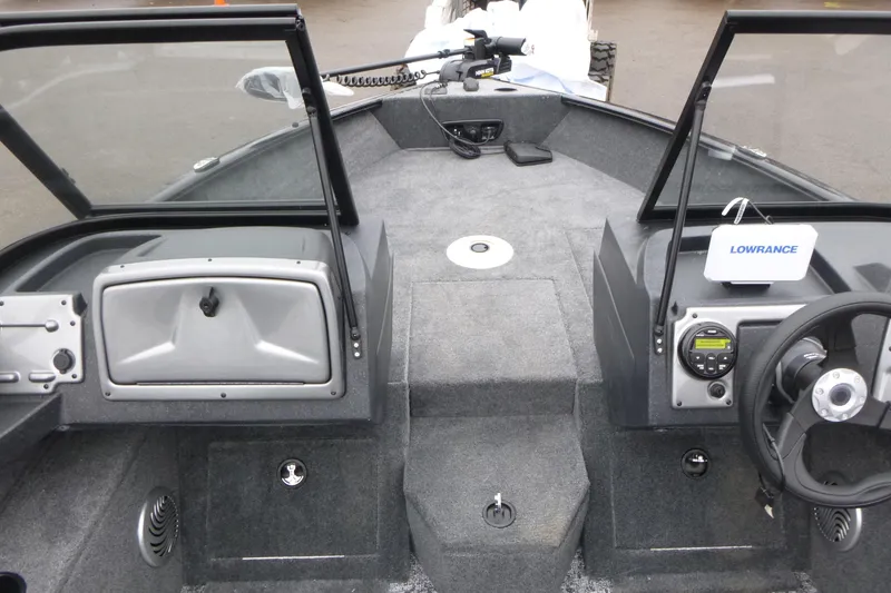 Slide: The Image of 2026 Tracker Pro Guide V-175 WT boat interior with steering wheel and Lowrance equipment. - 20