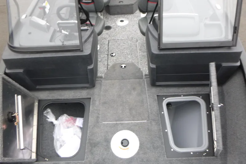 Slide: The Image of 2026 Tracker Pro Guide V-175 WT boat interior with storage compartments open. - 23