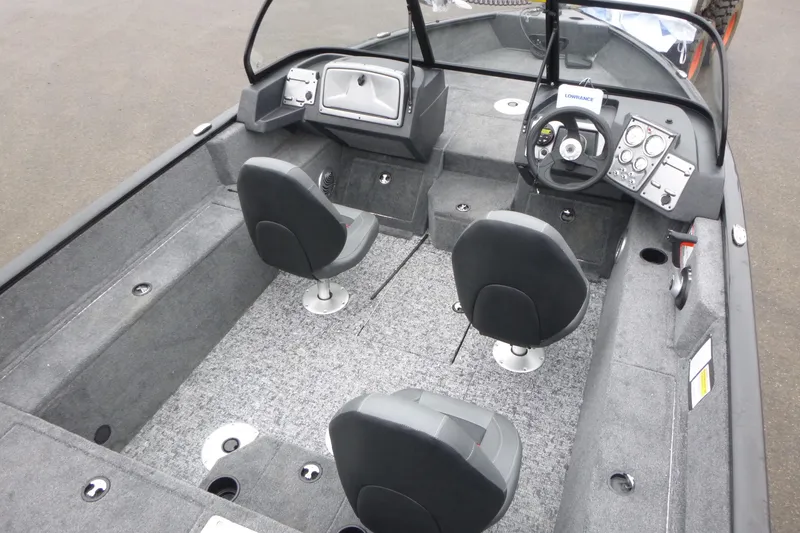 Slide: The Image of 2026 Tracker Pro Guide V-175 WT boat interior with seating and control panel. - 8