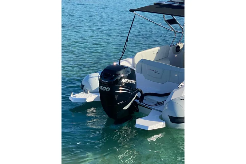 Slide: The Image of 2022 Ranieri CAYMAN 27.0 SPORT TOURING with Mercury 400 engine on clear water. - 26