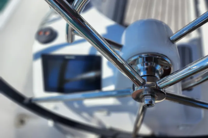 Slide: The Image of Close-up of Jeanneau Sun Odyssey 410 yacht steering wheel, 2020 model. - 15